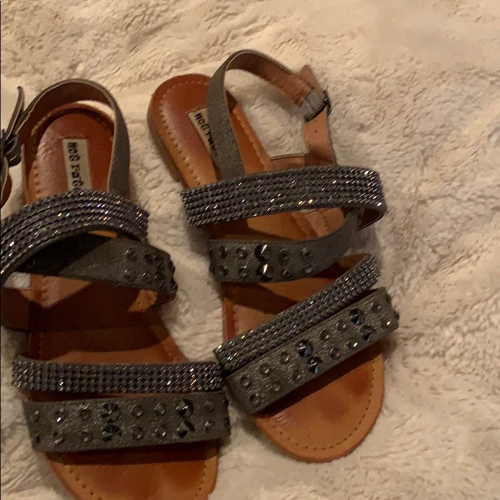 Glittery silver and black flat sandals